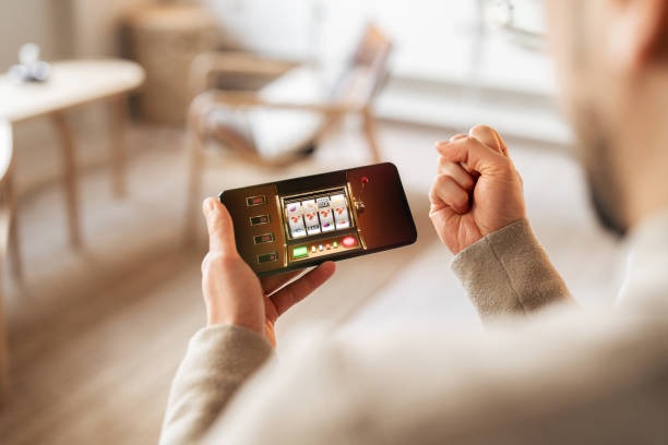 sayapbola login mobile app interface showing live football markets and payment options